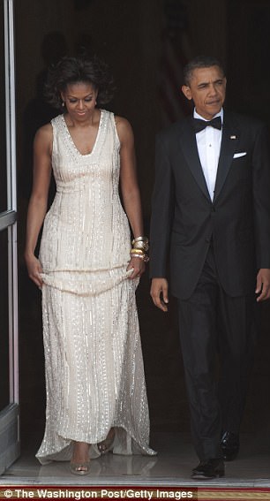 Above the couple is pictured at the state dinner in June 2011