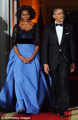 She added: 'Now, people take pictures of the shoes I wear, the bracelets, the necklace — they didn't comment that for eight years he wore the same tux, same shoes.' Above the couple is pictured at the state dinner in February 2014