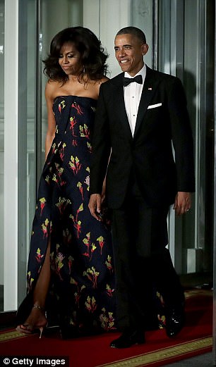 The former first lady said that her husband was proud of wearing the same tuxedo every year during his presidency. Above the couple is pictured at the state dinner in March 2016