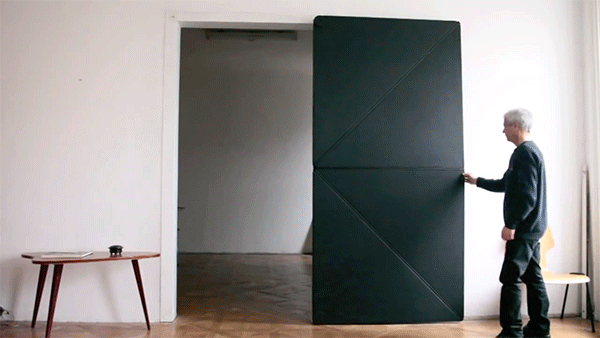 It is a 4-panel entryway that looks surprisingly like a normal door... until you touch it.