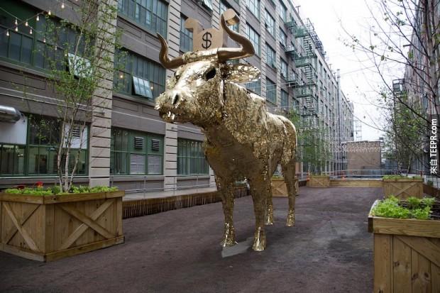 The artist's chosen image of a golden bull piñata simultaneously pays homage to his South American roots and criticizes the greed that often accompanies capitalism.