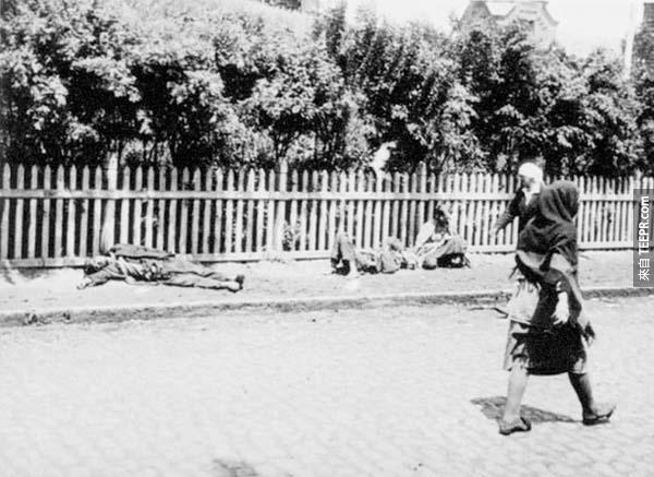 7.) The Holodomor: This Ukranian famine was one of the worst in history. It was a manmade event and recognized as a genocide of millions (comparable to the Holocaust). This is Kharkiv in 1933. Corpses lie in the street, while passers by just go about their day.