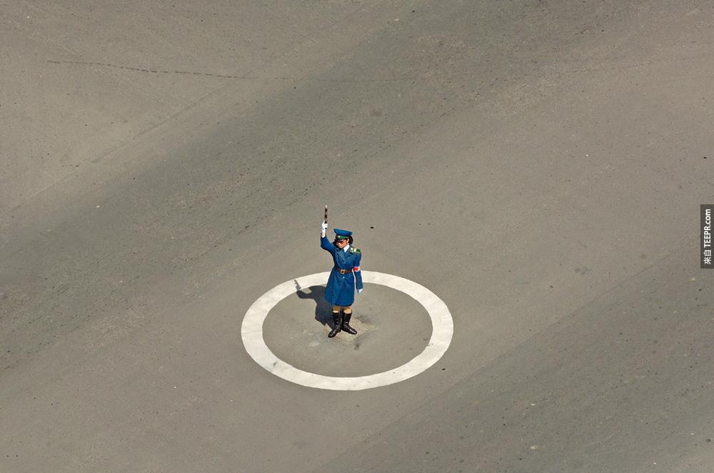 6.) Woman Working, North Korea