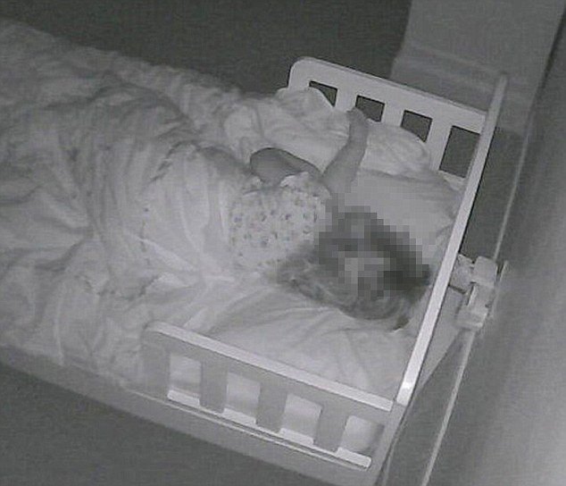 A baby in her cot: These personal webcam images were all easily accessible online last week 
