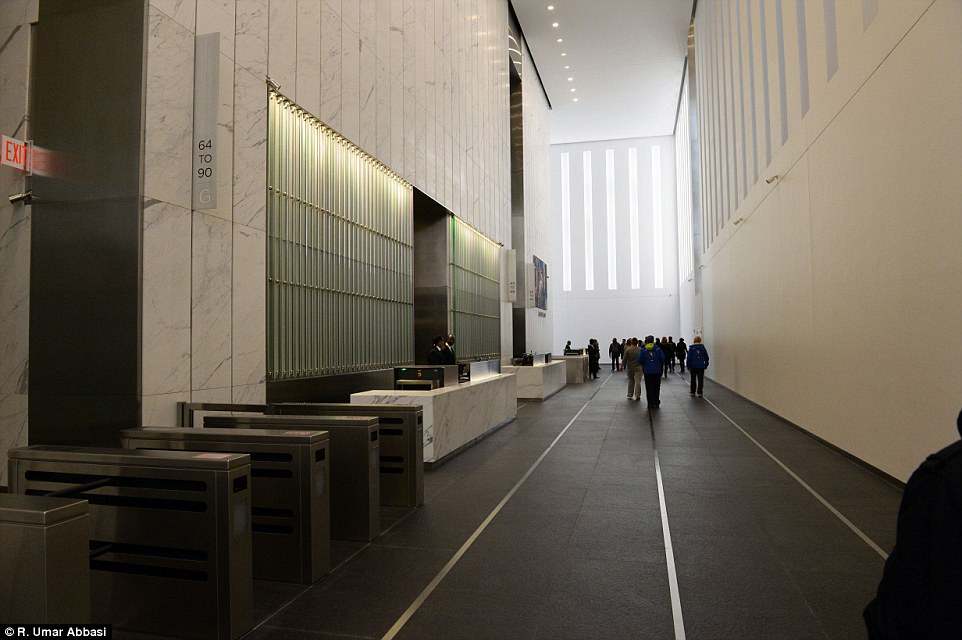 The stunning interior of the resurrected World Trade Center is revealed as the building opens for business 13 years after 9/11