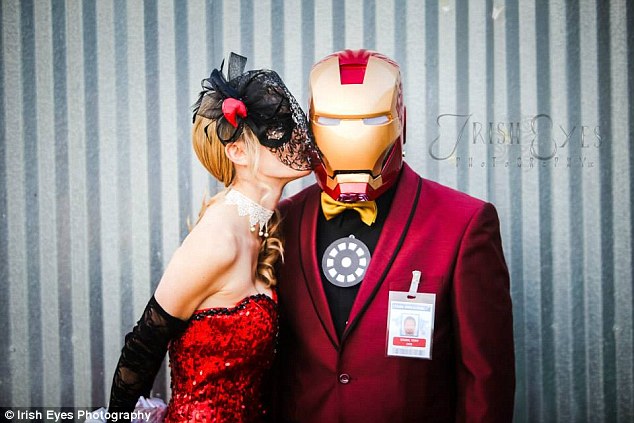 Getting in the spirit: Ali's dad Anthony walked her down the aisle in a frighteningly realistic Iron Man helmet 