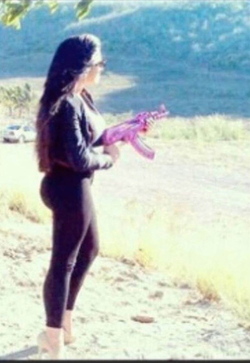 Claudia Ochoa Felix with her pink AK-47