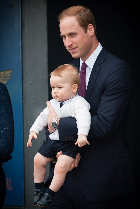 Prince George is carried through New Zealand's Wellington Airport during their recent tour of the country