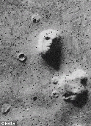 Dr Brandenburg says evidence for the explosions exists near two sites that apparently had life in the past, including Cydonia, the location of the famous 'face on Mars' spotted from orbit (shown)