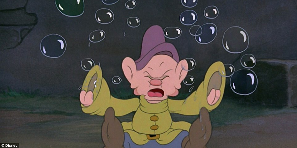 Can you spot Mickey in this shot of Dopey in Snow White and the Seven Dwarfs?  The practice is now so widespread that finding Mickey is considered a sport among Disney lovers with entire websites set up to document the hidden icon