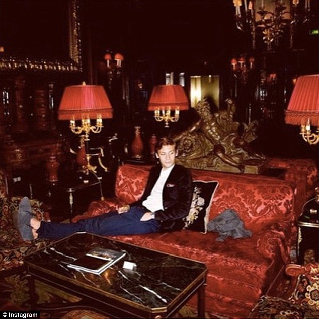 Lap of luxury: Even a casual night with your feet up is a whole other world for these wealthy teenagers
