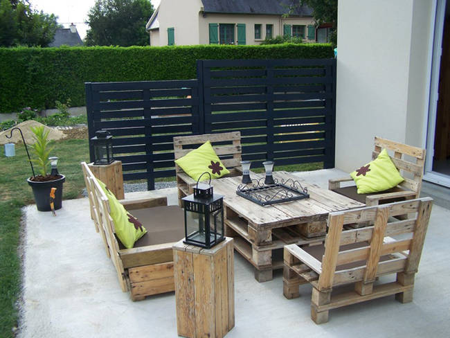 14.) This wooden pallet deck set (from the tables and chairs to the divider) looks like the perfect place to relax on a warm summer evening.