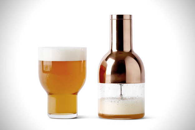 Drinking beer from a bottle at home will never be the same as getting a pint at a bar... unless you have this beer foamer.