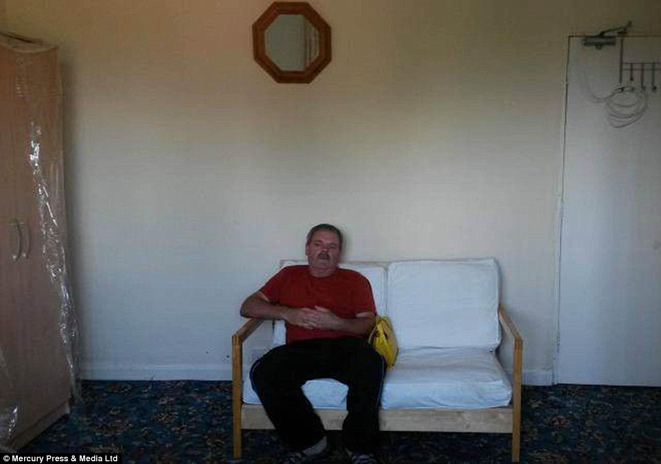 Lounging about: This image has all the makings of a classic estate agent picture - except the resident has decided to take a seat for the shot