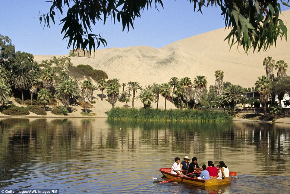 The magical town is called Huacachina, and it can be found  in a barren desert in Peru