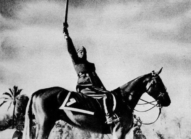 Benito Mussolini's horse handler was removed from this photograph to make the dictator appear to be more of striking, independent figure.