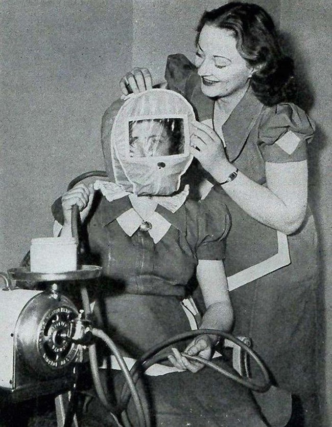 The woman in this photo is wearing a so-called "Glamour Bonnet." The bonnet promised to give users a rosy, glowing complexion. It did this by lowering atmospheric pressure around the head to alpine conditions. Something about that doesn't sound safe.