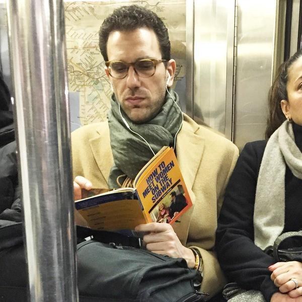 This guy reading this book on the subway.