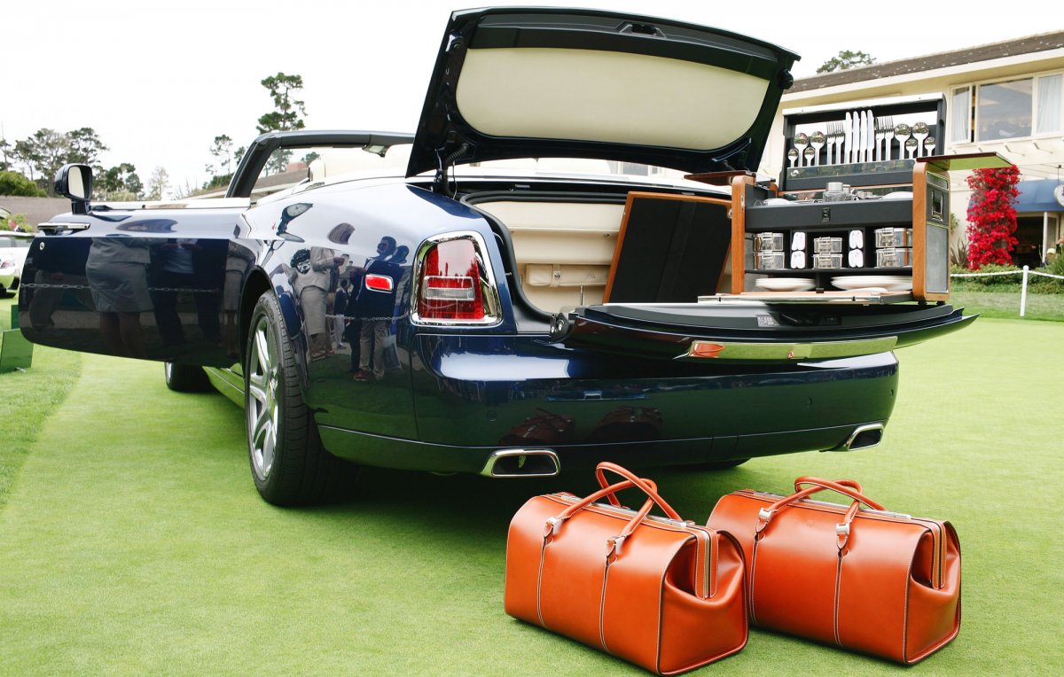 Pro tip: Make sure your luggage and luxury car match. 
