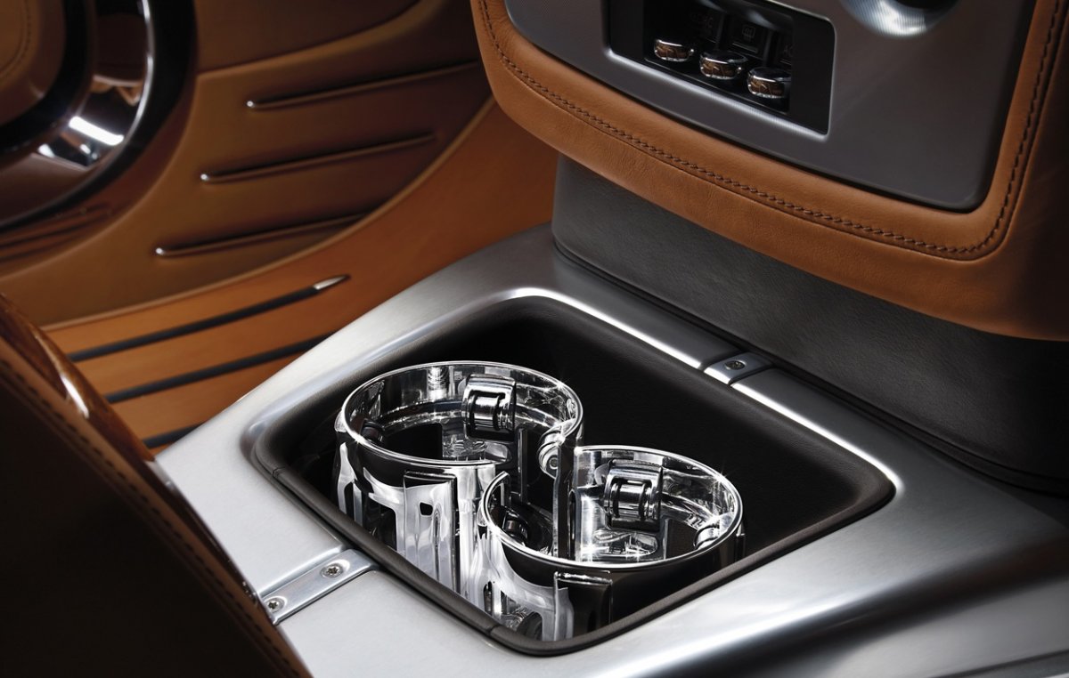 Rolls says the aluminum cup holders "deliver functionality, but with that special combination of theatre and jewelery." Bespoke designer Alex Innes called them a "wonderfully opulent solution."