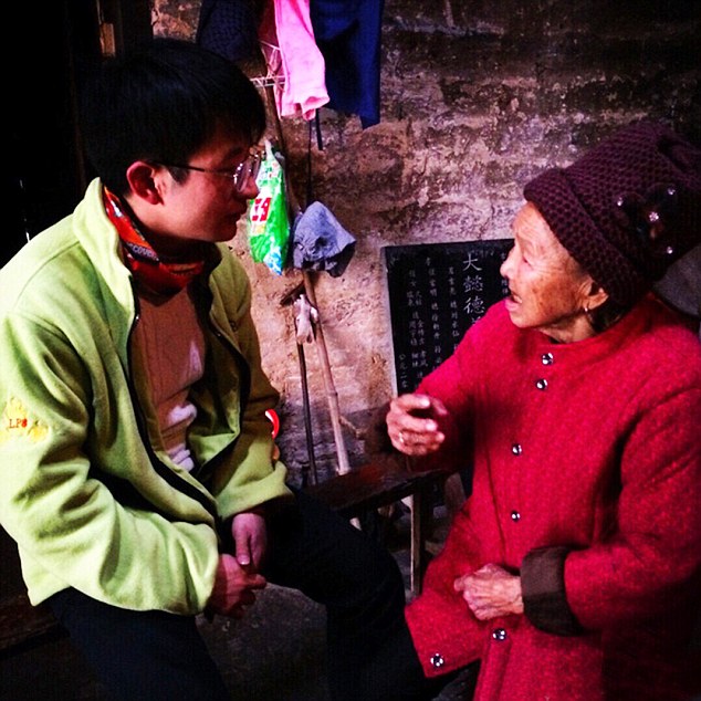 A friendly face: the village in China's Jiangxi province has been overrun with strangers touched by Su's plea