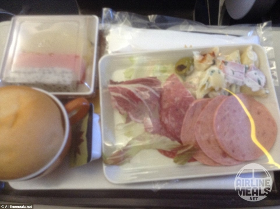 This Vietnam Airlines meal, with the meat tossed on top of a watery sauce, looks less than appealing for the consumer