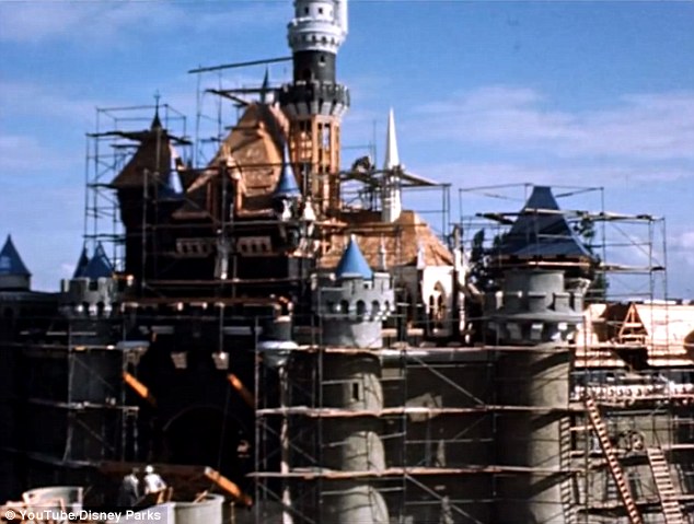 Sleeping Beauty Castle at the original Disneyland in Anaheim, California, emerges from scaffolding