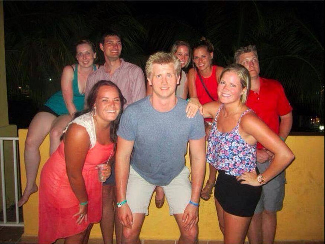 I'm not sure what's worse here: the timing of the photo, or that unfortunate pose.
