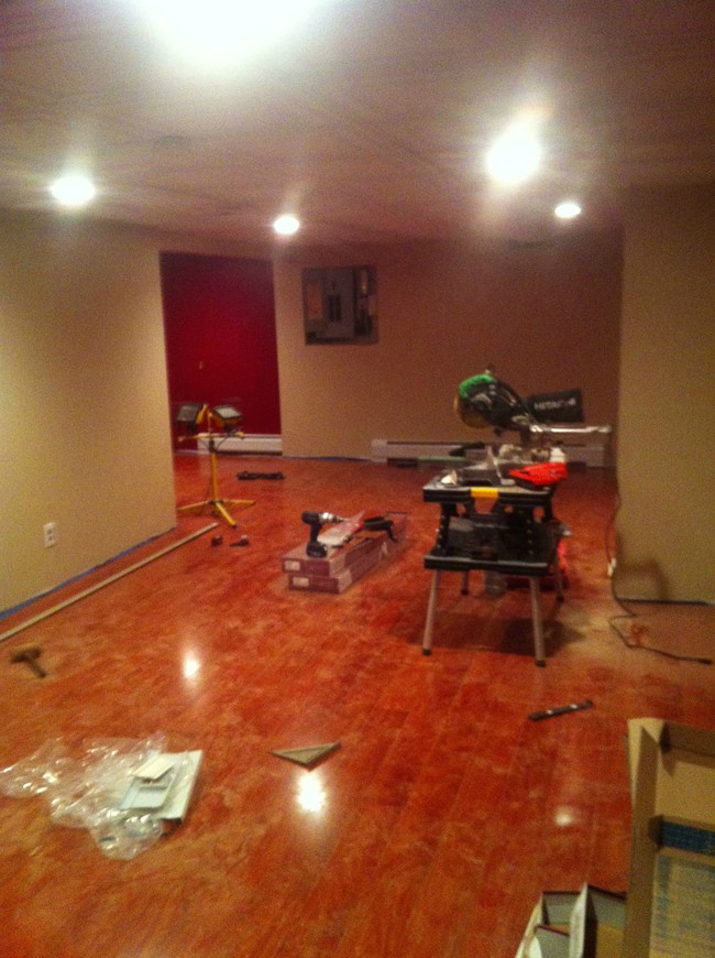 Then he completely redid the basement, adding new hardwood floors, ceiling tiles, and a fresh paint job.