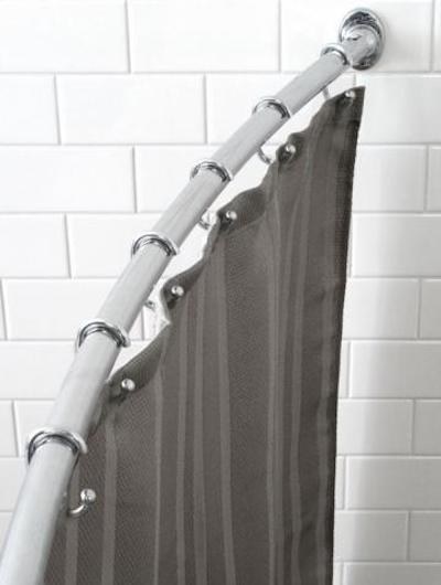 Use a curved shower rod for a bigger-feeling shower.
