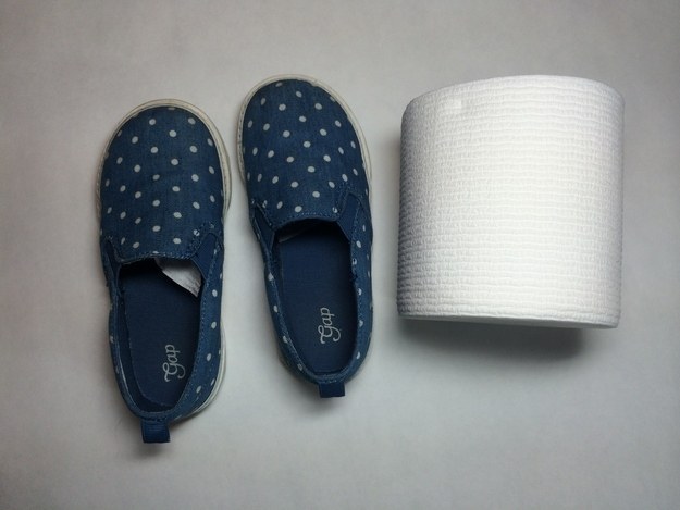 Stuff toilet paper into the toe of your kid’s shoes.