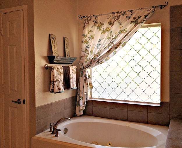 Make your bathroom ~extra private~ by frosting windows using contact paper.