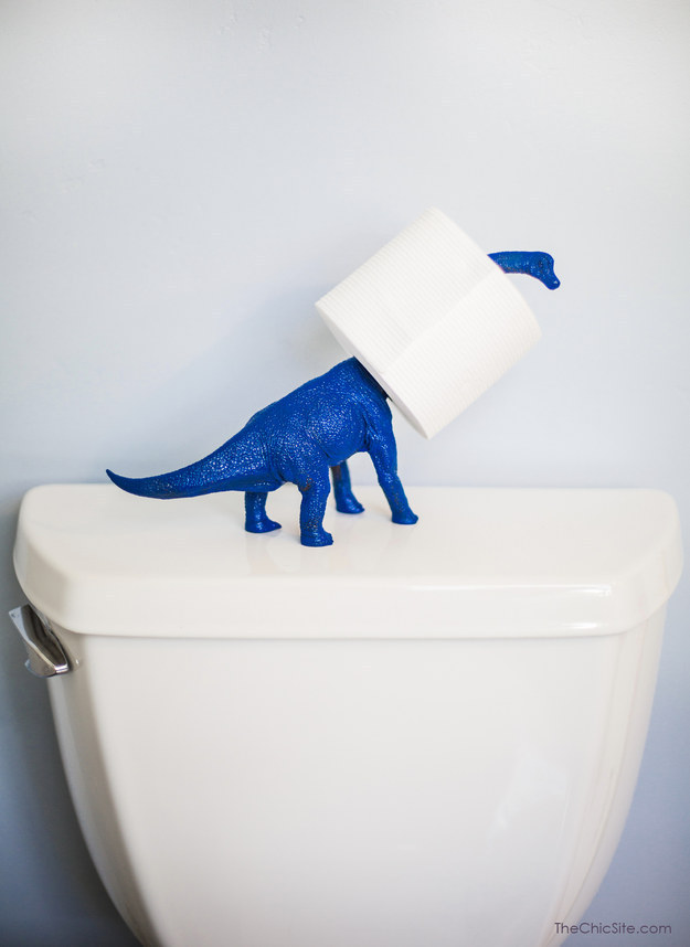 And make visits to the bathroom way more fun with a dino toilet paper holder.