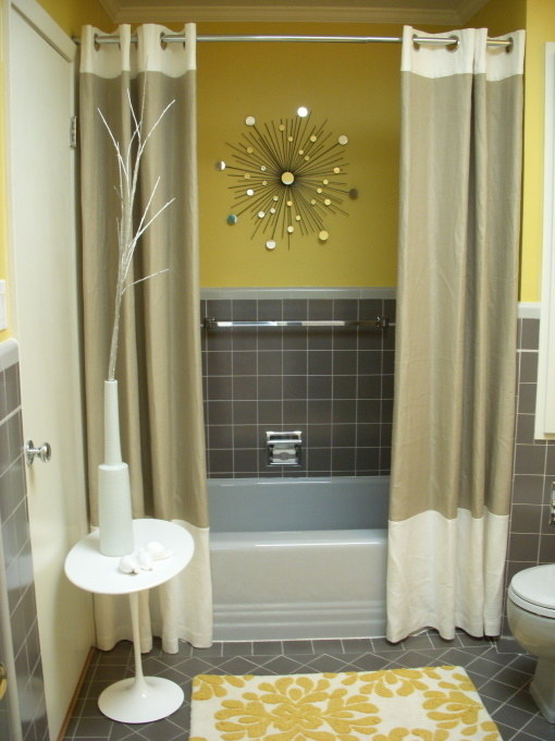 And use two shower curtains for a grander tub.