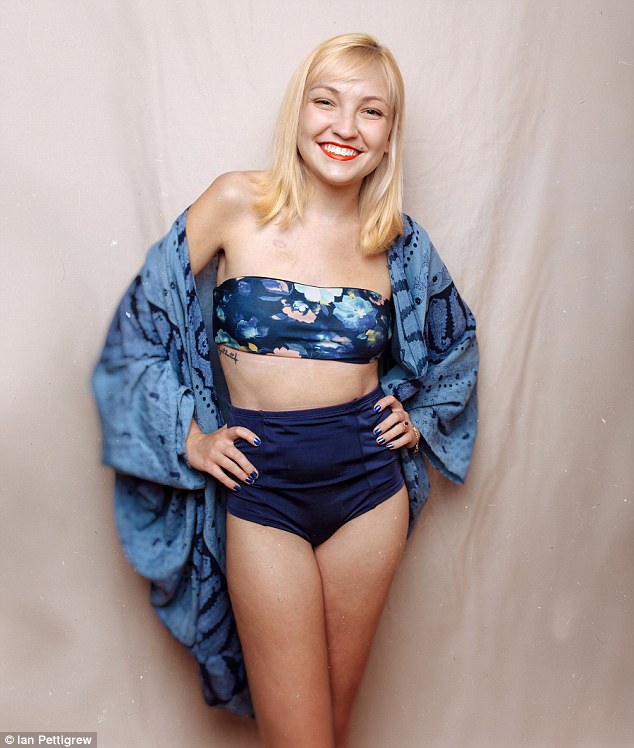 Pin-up inspired: This model proudly posed with her hands on her hips in a floral bandeau top and high-waisted briefs 
