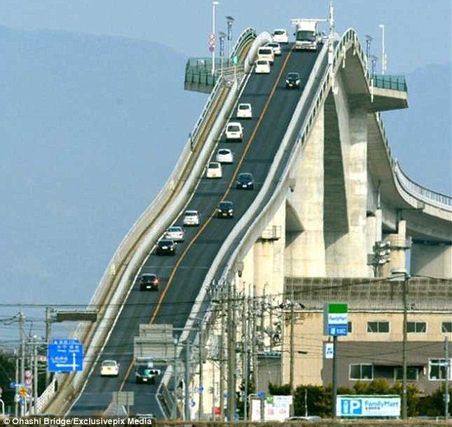 The Eshima Ohashi bridge in Japan – the third largest of its kind in the world – rises sharply so ships can pass underneath