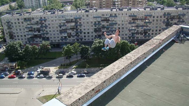 Russian freerunner Pavel Kashin attempting a backflip on top of a 16-story building. He landed successfully, but lost his balance and fell to his death.