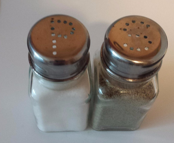 These salt and pepper shakers that were clearly abused by their owners: