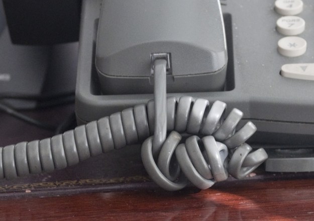 Accidentally pulling your home phone off the table when you answered it because the receiver cord was tangled.