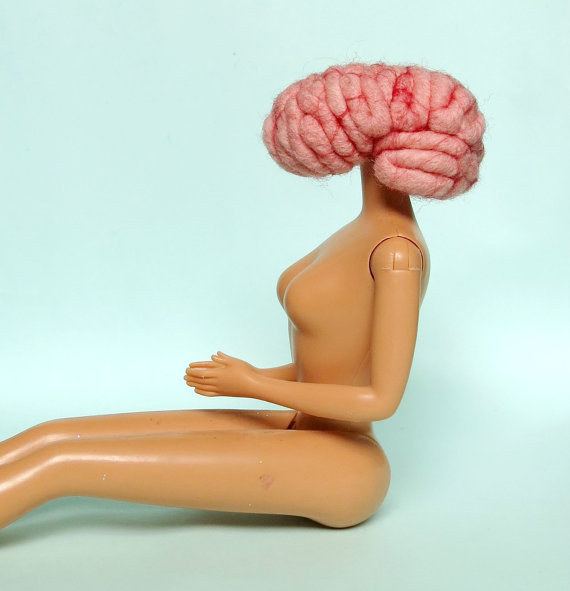 This Barbie with a brain for a head.