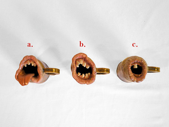 Mugs shaped like gaping human mouths.