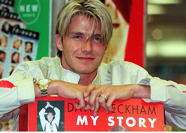 David shows off his new platinum locks as he signs copies of his biography David Beckham My Story in 1998