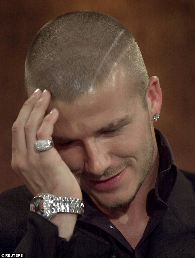 David also shows off his new shaved head detailing in the same interview in 2001