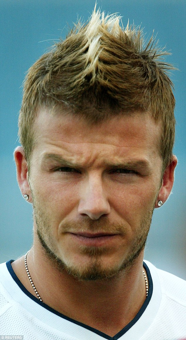 David sports a longer mohawk and two diamond earrings for the World Cup in 2002 