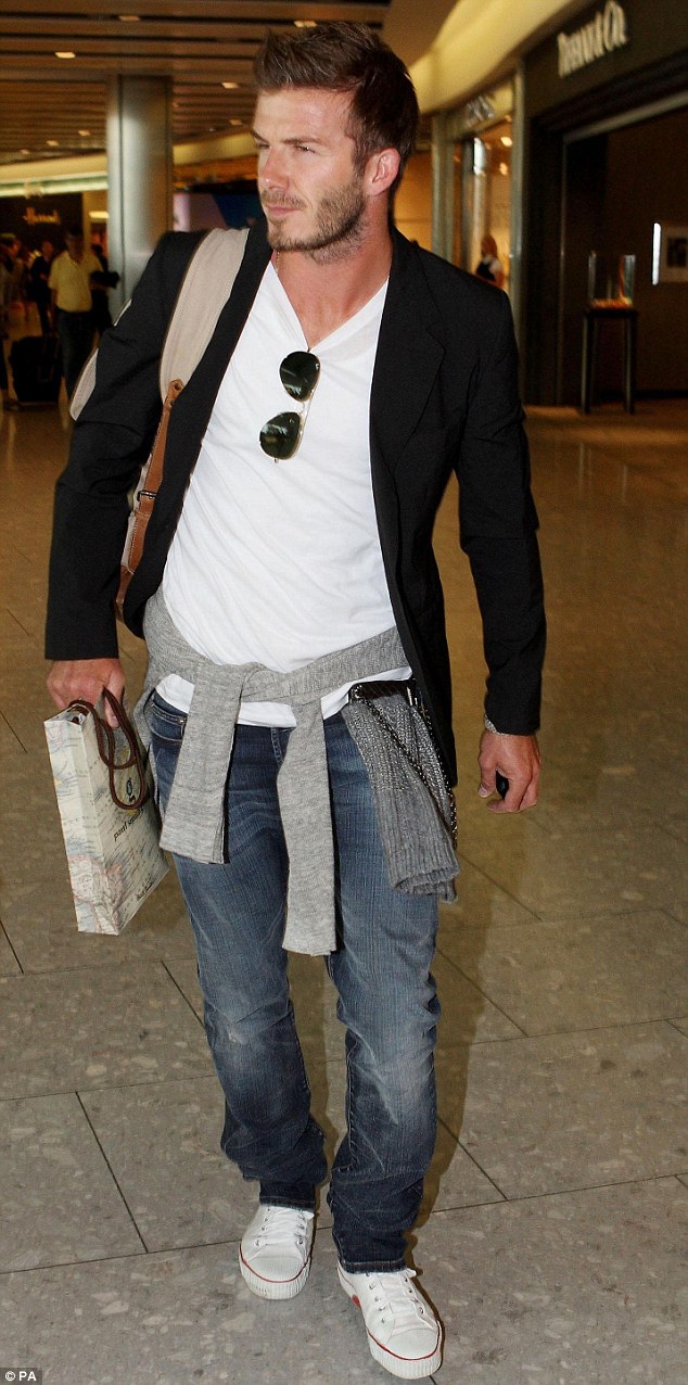 On his way to the royal wedding, David Beckham has nailed airport style 