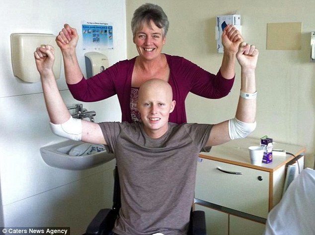 Strong: Neil pictured with his mother just before he was given the all-clear in April 2013. His sister Sarah said he was never ashamed about his illness and wanted to go out and show others that it didn't matter what he looked like