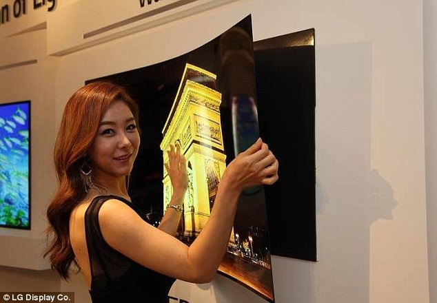 The ultrathin 'wallpaper TV' is less than 1mm thick, and at 1.9kg (4lbs) it is so light it can be attached to the wall using magnets. The concept set was unveiled at a press event in Korea