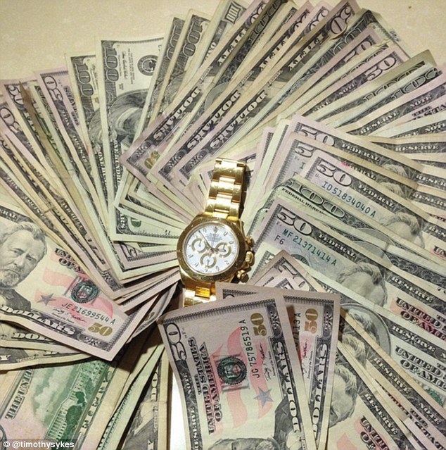 Loads of money: Sykes posts pictures of wads of cash and designer watches on his instagram account
