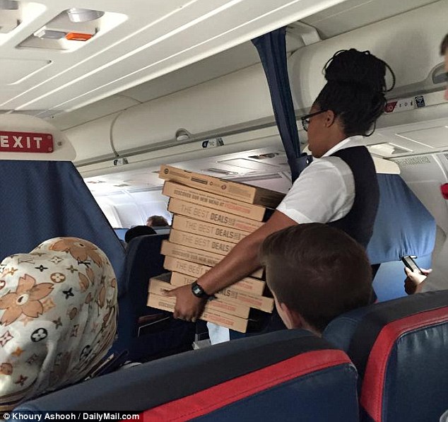The pizza may not have placated everyone on board, but the toppings certainly helped