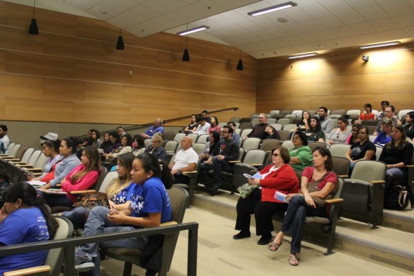 An auditorium hosts screenings, classes, and lectures on a variety of subjects. 